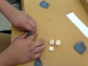 Sanding their tiles