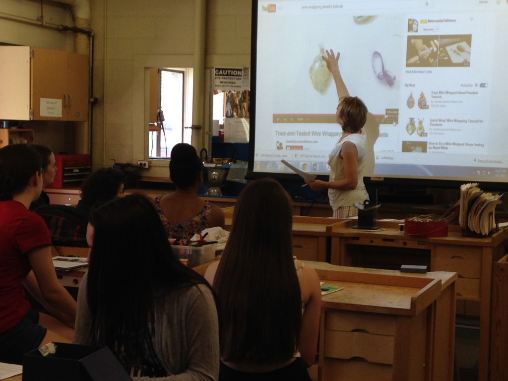 Ms. Burns showing the students how wire wrapping should be completed