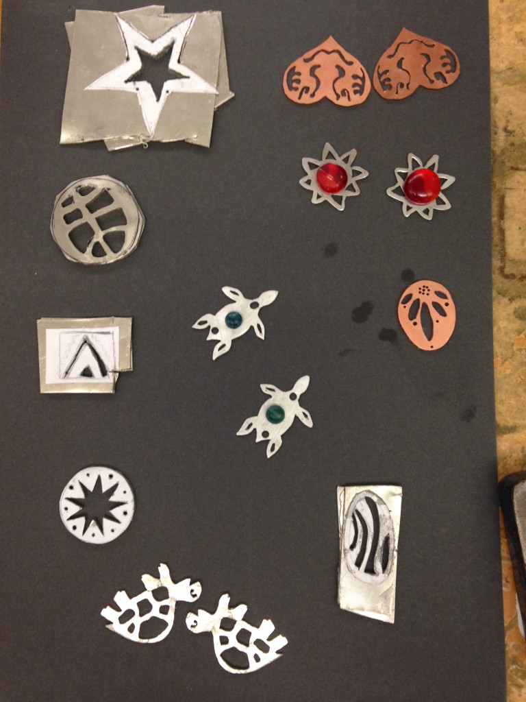 Pierced pendants for group critique